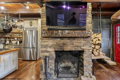 Tucked away on a serene 2-acre wooded lot in the highly - photo 8
