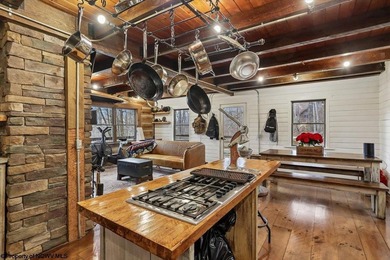 Tucked away on a serene 2-acre wooded lot in the highly - photo 9