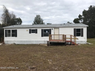 Lake Home For Sale in Fort Mccoy, Florida