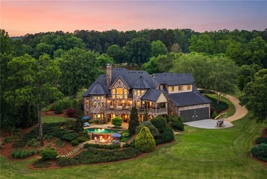 Set on more than 22 acres of private, manicured grounds, this - photo 1