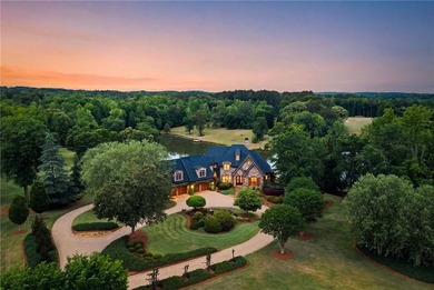 Set on more than 22 acres of private, manicured grounds, this - photo 3