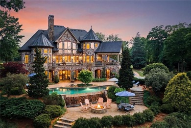 Set on more than 22 acres of private, manicured grounds, this - photo 4