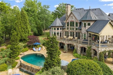 Set on more than 22 acres of private, manicured grounds, this - photo 5