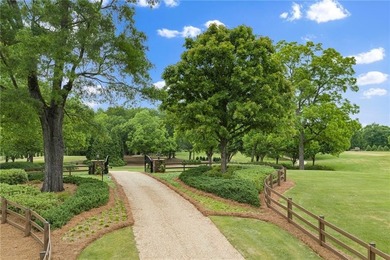 Set on more than 22 acres of private, manicured grounds, this - photo 6