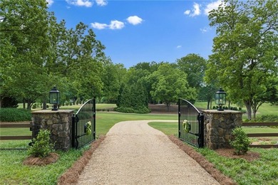 Set on more than 22 acres of private, manicured grounds, this - photo 7