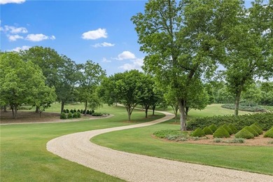 Set on more than 22 acres of private, manicured grounds, this - photo 8
