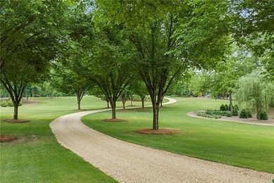 Set on more than 22 acres of private, manicured grounds, this - photo 9