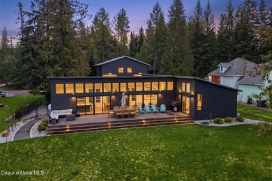 Set along the water's edge on a .44-acre lot, this beautifully - photo 5