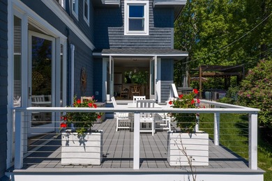Perched on an elevated 1+ acre lot in the coveted Shore Acres - photo 7