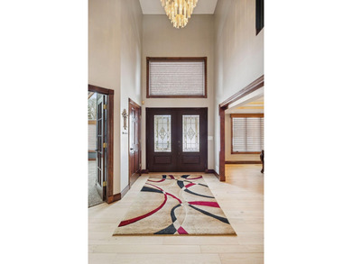 Stunning Crosswinds neighborhood home overlooking a serene pond - photo 5