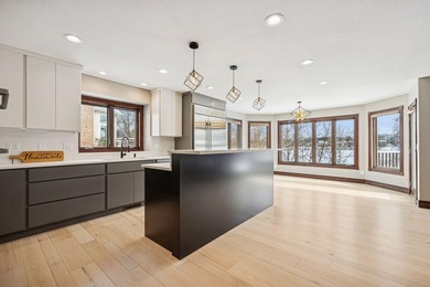 Stunning Crosswinds neighborhood home overlooking a serene pond - photo 9