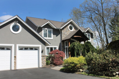 Custom built 5,000 square foot lake home on 1.3 private acres! - photo 2