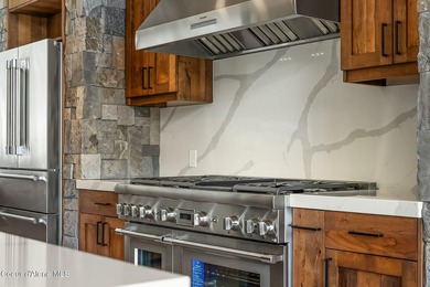 Stunning custom home with sweeping treetop and mountain views - photo 10