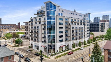 Urban living at its best. The open-concept layout is ideal for - photo 1