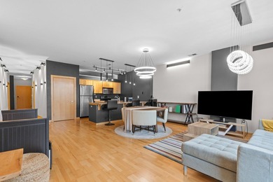Urban living at its best. The open-concept layout is ideal for - photo 6