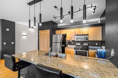 Urban living at its best. The open-concept layout is ideal for - photo 8