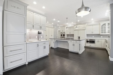 Experience golf course living at its finest in this exceptional - photo 9