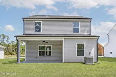 TO BE BUILT! The Carolina's open-concept layout seamlessly - photo 3