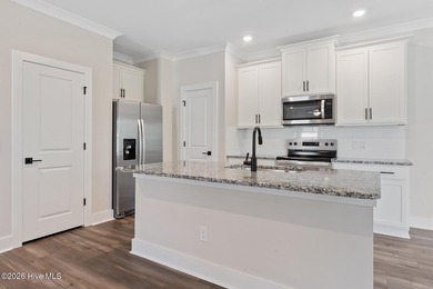 TO BE BUILT! The Carolina's open-concept layout seamlessly - photo 8