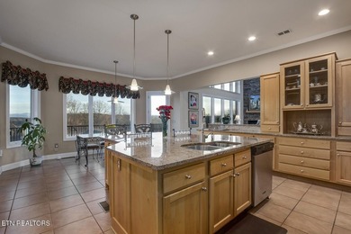 Floor to ceiling windows provide SPECTACULAR LAKE AND MOUNTAIN - photo 16