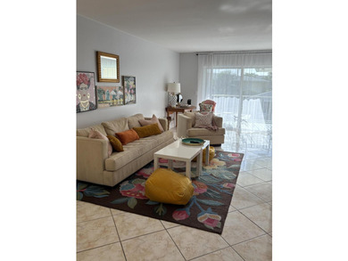 Move right in to this charming THREE bedroom condominium, in the - photo 1