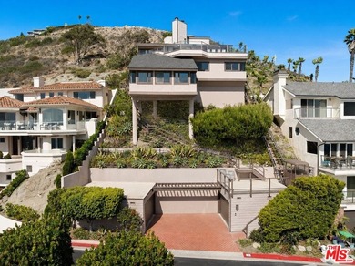 Perched above one of Orange County's most coveted stretches of - photo 2