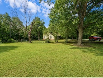 Charming retreat near the water! Nestled on almost an acre, this - photo 6