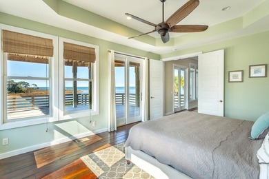 Panoramic sunset views and unmatched waterfront living in this - photo 20