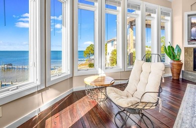 Panoramic sunset views and unmatched waterfront living in this - photo 31
