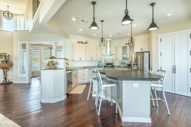 Panoramic sunset views and unmatched waterfront living in this - photo 32