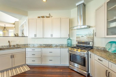 Panoramic sunset views and unmatched waterfront living in this - photo 34