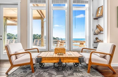 Panoramic sunset views and unmatched waterfront living in this - photo 36