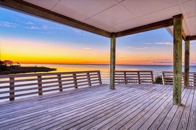 Panoramic sunset views and unmatched waterfront living in this - photo 46