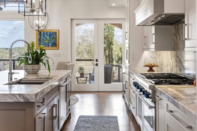 Custom-built waterfront estate on 5.25 private acres with