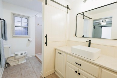 This classic ranch-style home sits gracefully on 62 sprawling - photo 14