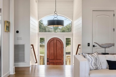 Custom-built waterfront estate on 5.25 private acres with