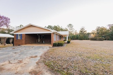 This classic ranch-style home sits gracefully on 62 sprawling - photo 31