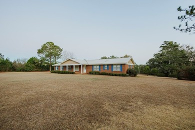 This classic ranch-style home sits gracefully on 62 sprawling - photo 32