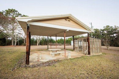 This classic ranch-style home sits gracefully on 62 sprawling - photo 35