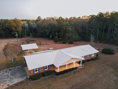 This classic ranch-style home sits gracefully on 62 sprawling - photo 36