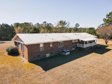 This classic ranch-style home sits gracefully on 62 sprawling - photo 37