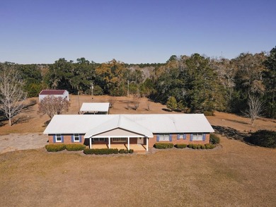 This classic ranch-style home sits gracefully on 62 sprawling - photo 40