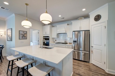 Welcome to this stunning Charleston single-style home in The - photo 42