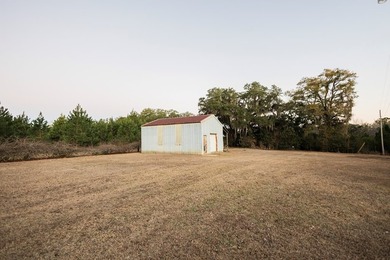 This classic ranch-style home sits gracefully on 62 sprawling - photo 42
