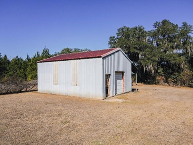 This classic ranch-style home sits gracefully on 62 sprawling - photo 43
