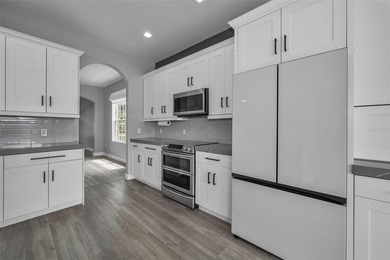 Virtually Staged. Welcome to this stunning 3,406-square-foot - photo 22