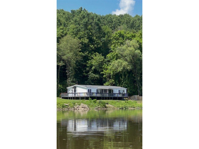 Welcome to a truly unique waterfront retreat where breathtaking - photo 1