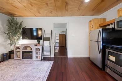 Escape to lake life in this charming fully furnished 1-bedroom - photo 7