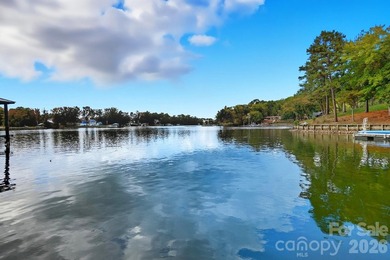 Live the Lake Life Every Day! This stunning waterfront home on - photo 1