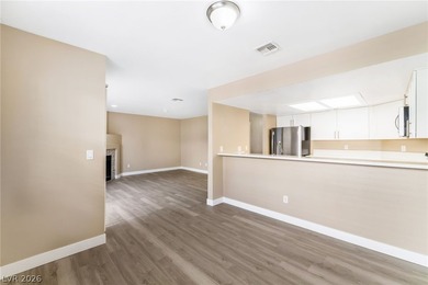 Don't miss this beautifully updated first-floor condo in a very
